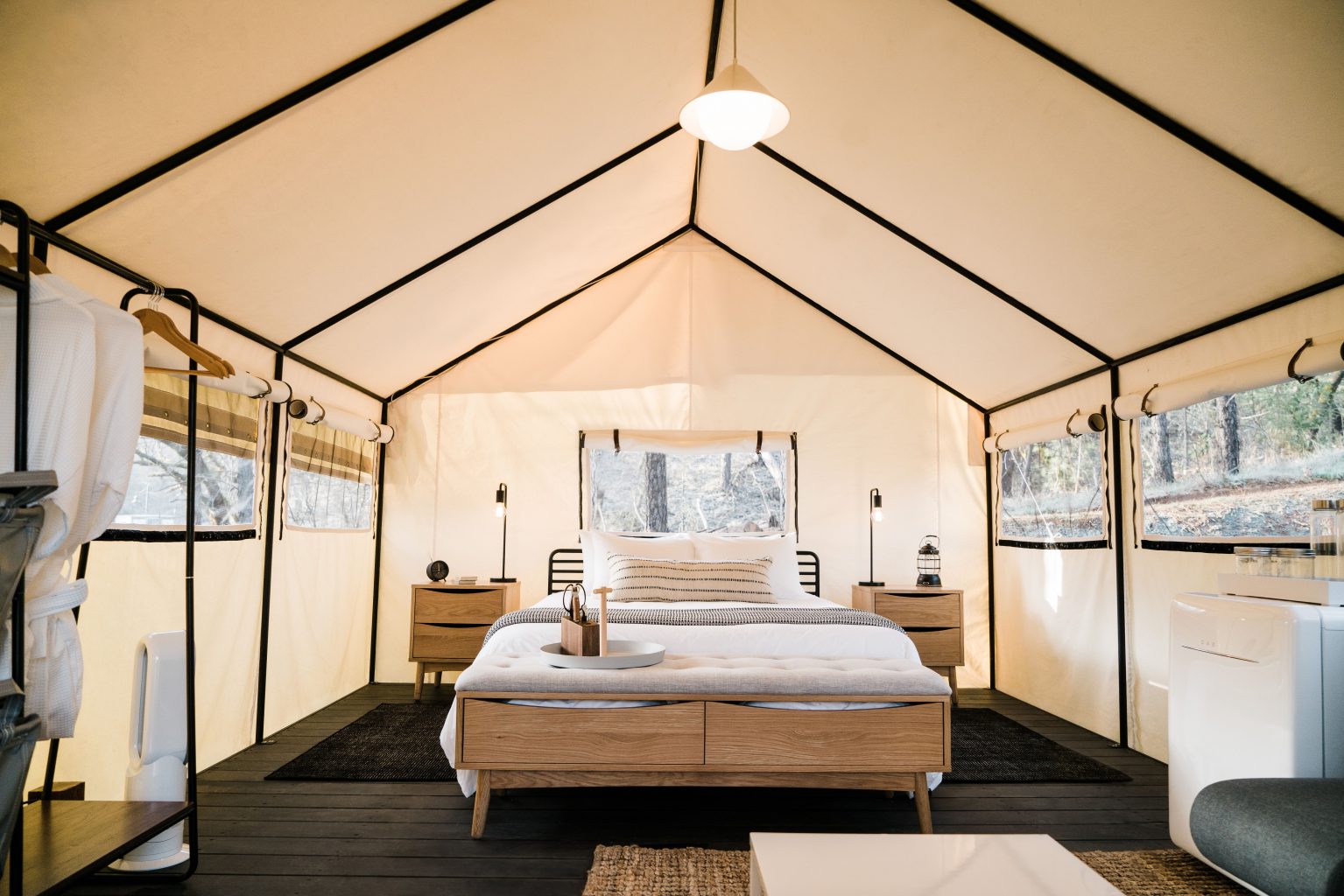 a tent with a bed inside of it
