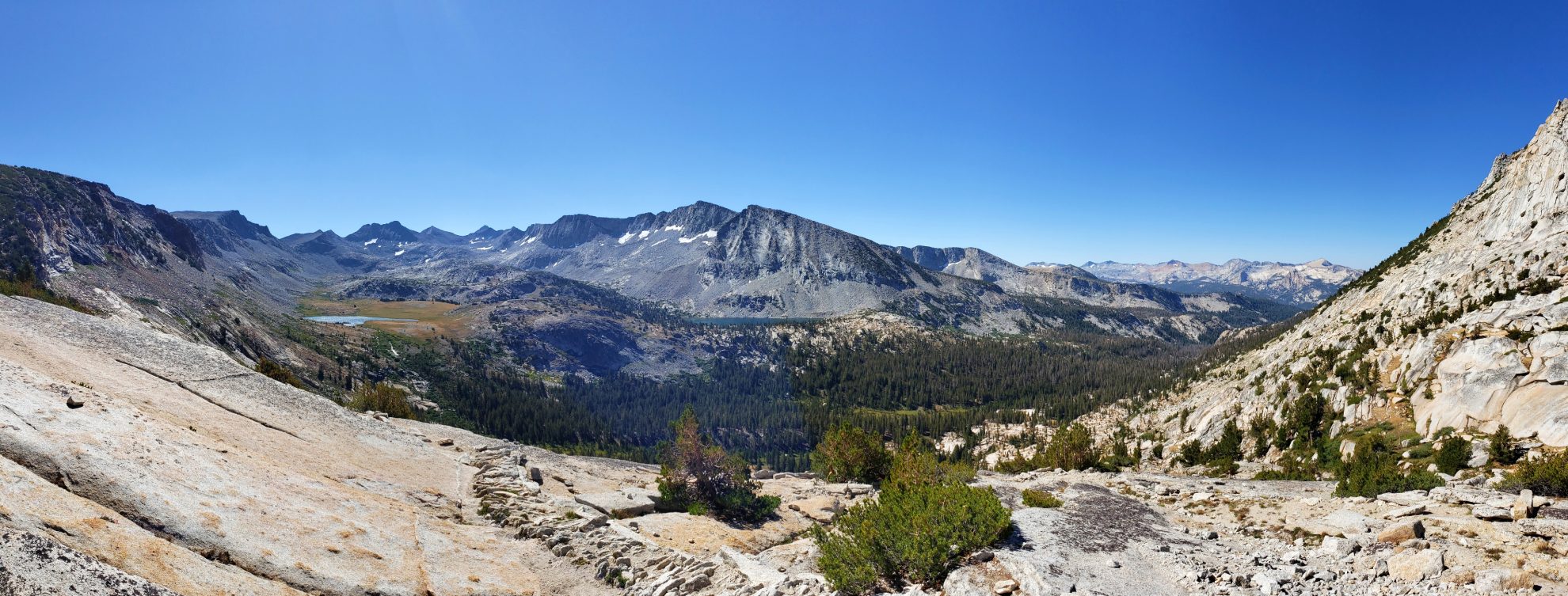 a panoramic view of the mountains and trees