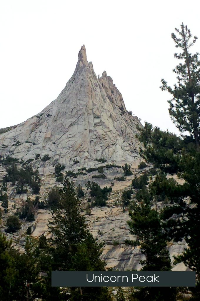 a mountain with a sign that says unicorn peak