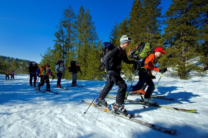 Group cross country skiing at a SNO-Park.