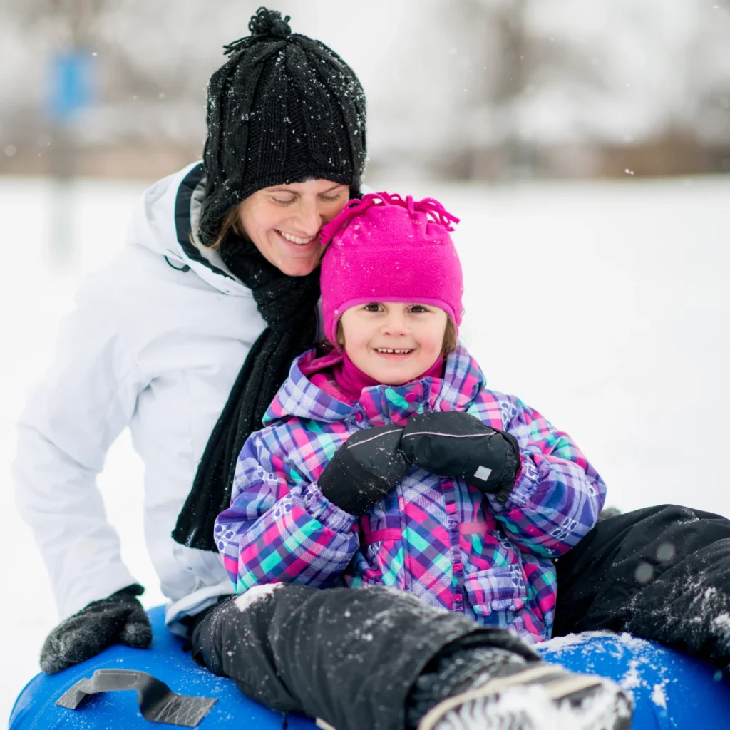 mom and daughter tubing